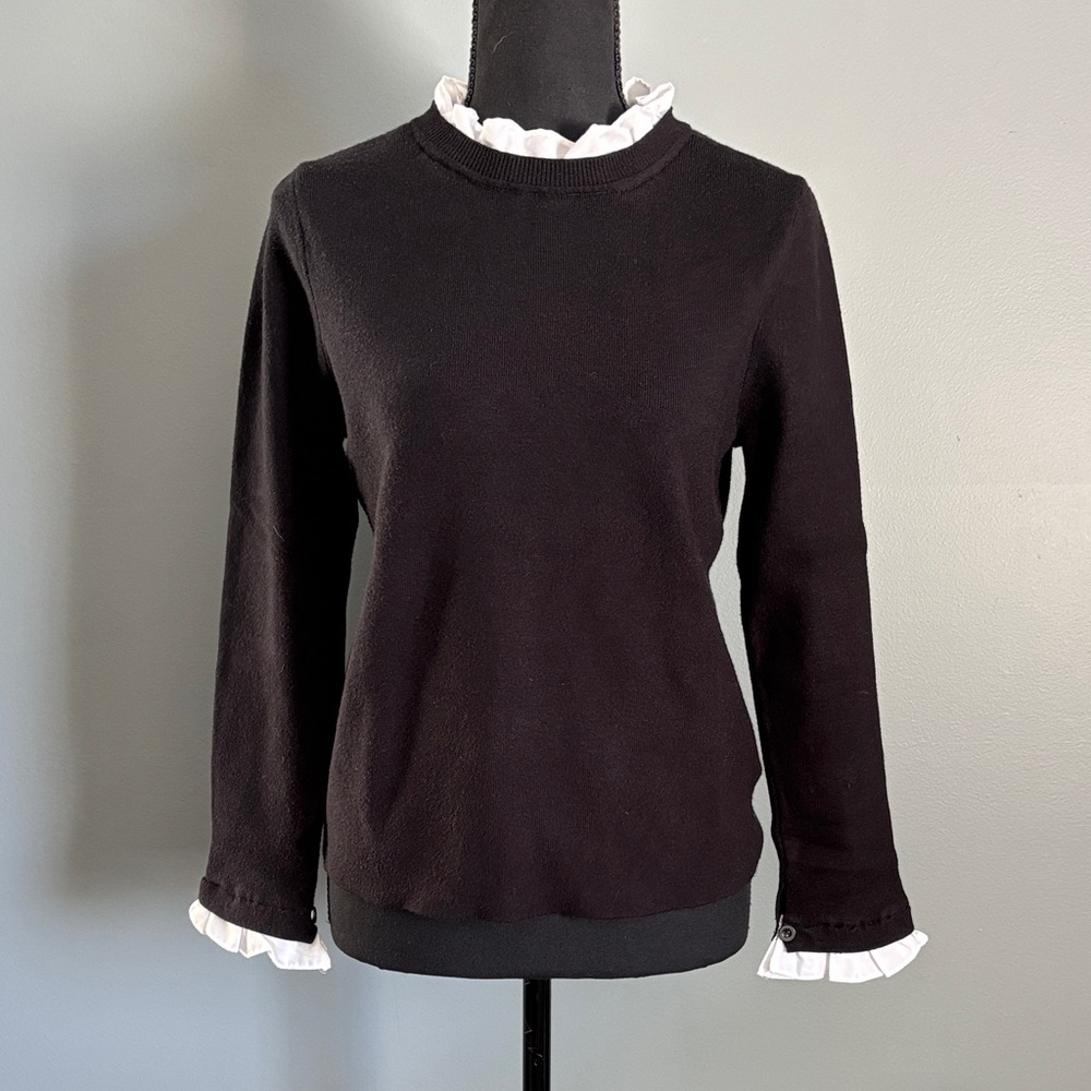 Elegant Black Sweater with White Ruffle Accents
